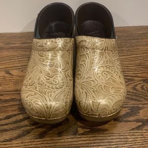 Wood and goldish Dansko clogs
